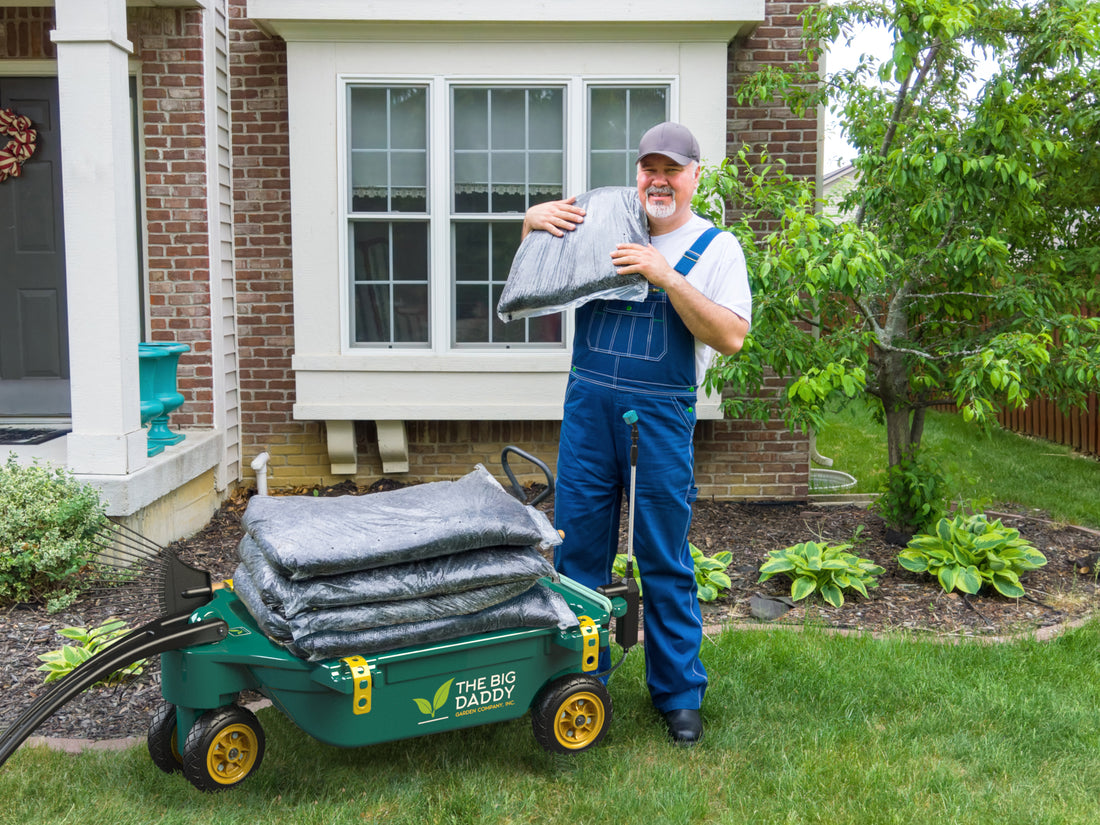 man in yard using top garden caddy